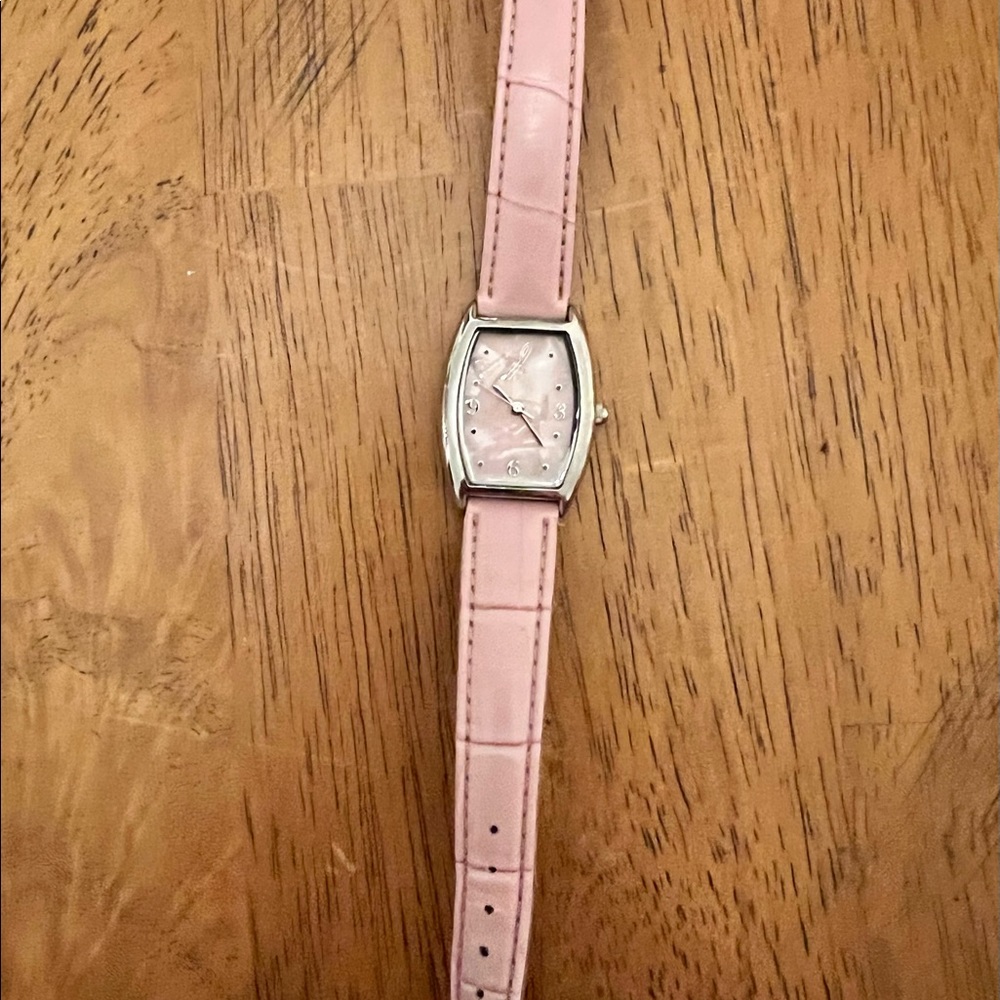 Beautiful pink face Women’s watch.  With pink hand.